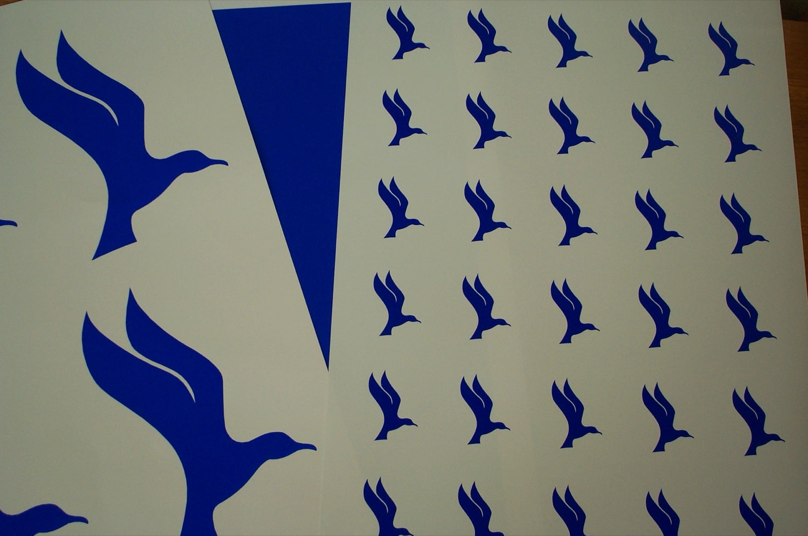 Sheet printed with the Holliday bird mark in ultramarine blue ink