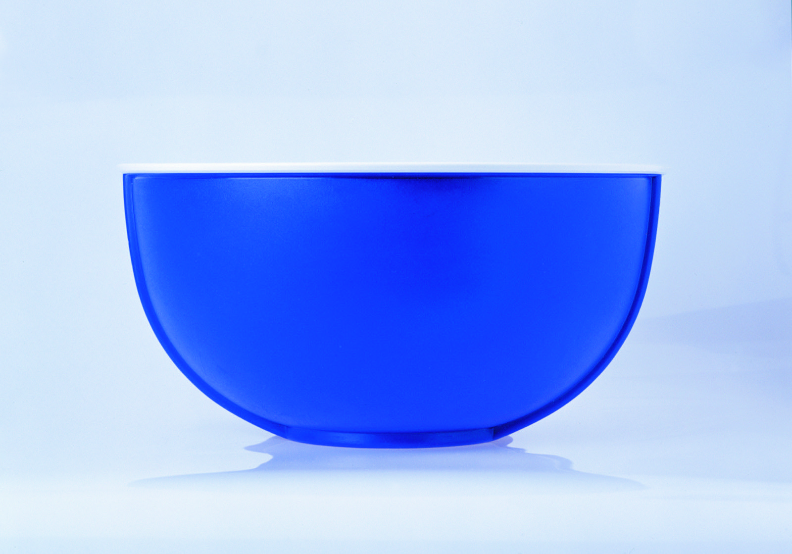 Deep blue moulded plastic bowl coloured with ultramarine pigment