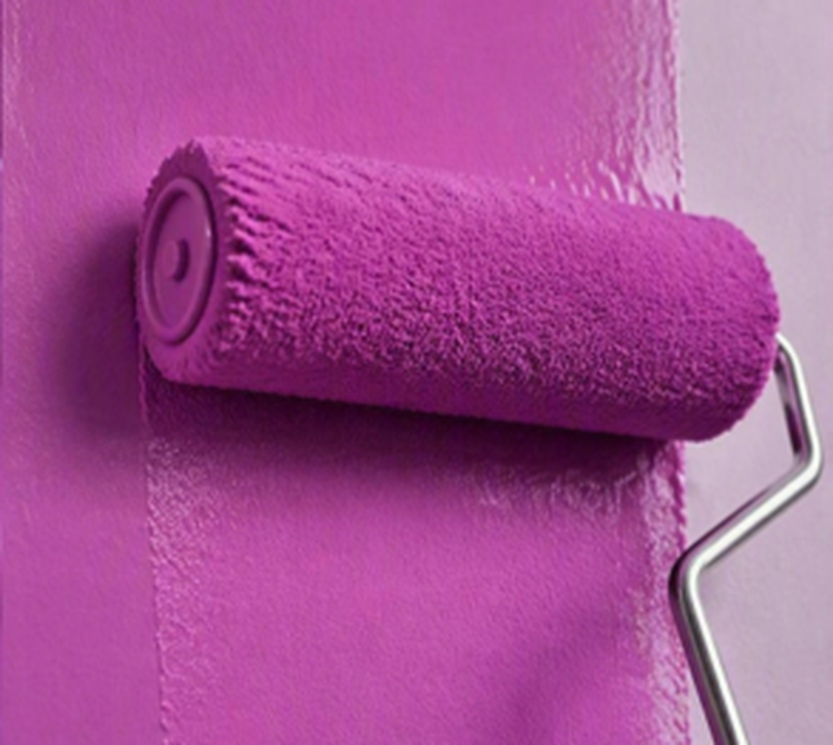 Pink paint roller applying colour